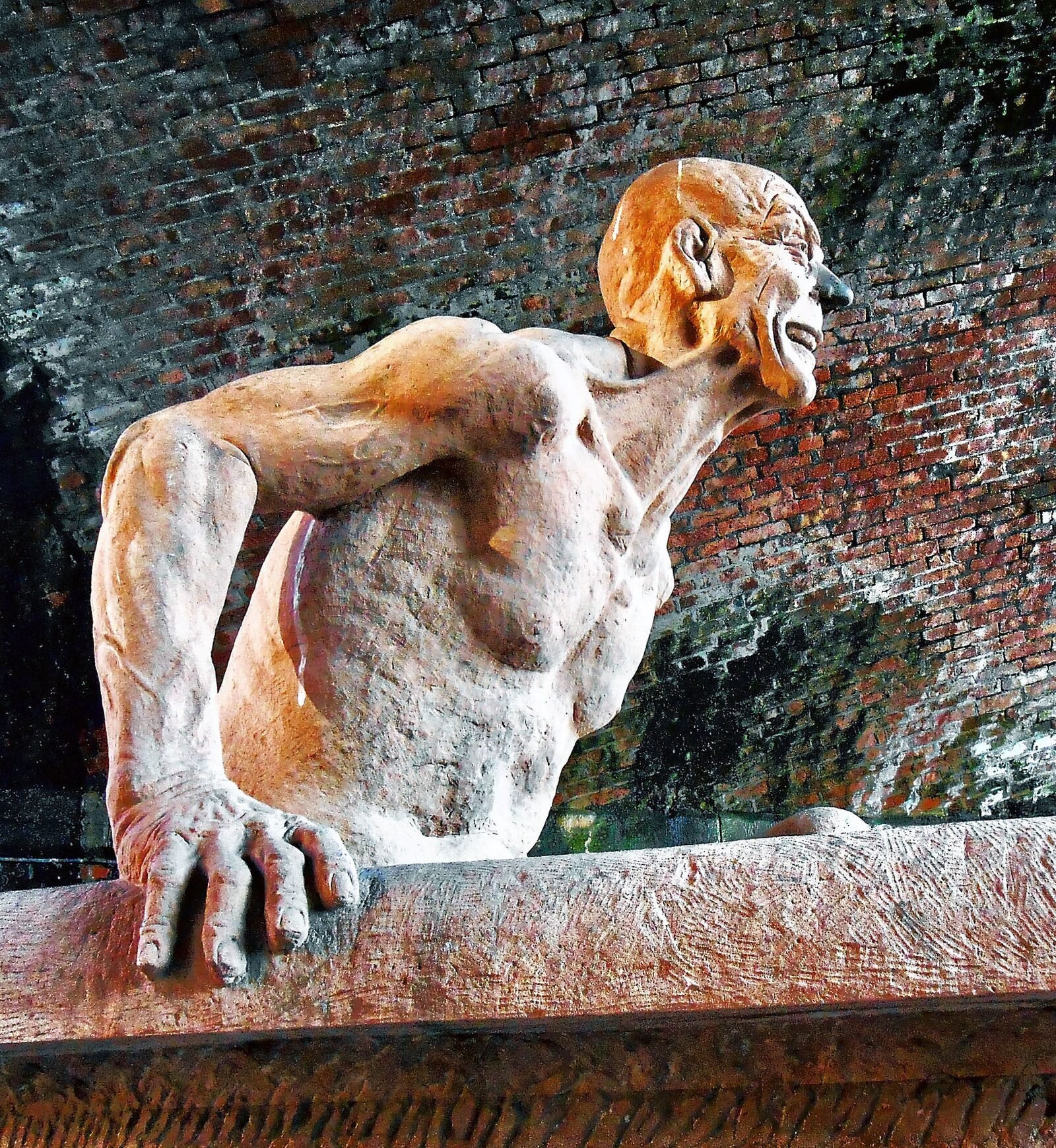  Eureka 10 ft. x 10 ft. x 9ft. sculpture in red sandstone. commissioned by U.M.I.S.T. Manchester. Sighted at altringham terrace on the campus of U.M.I.S.T. university. The sculpture shows Archimedes at his most famous moment, carved for the university to describe the essence.